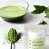 Ceremonial grade matcha Miyabi with a Matcha powder in a spoon, prepared Matcha and Matcha tins