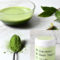 Ceremonial grade matcha Miyabi with a Matcha powder in a spoon, prepared Matcha and Matcha tins