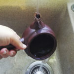 Washing-teapot-with-warm-water