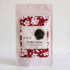 Sakura Sencha tea blend with Fukamushi Sencha, cherry blossom leaves, and petals from Shizuoka, Japan.