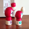 This modern creative Kokeshi doll is called '高砂 Takasago' and it was created by an award-winning artist '関口東亜 Sekiguchi Toua'. Takasago is a traditional Noh play. It is considered a very auspicious story, involving a loving and long-married couple. The play was formerly known as Aioi or Twin Pines This is a cute old couple Kokeshi dolls.  Their posture is cute and their calm smile is also charming. Available j-okini in Malta