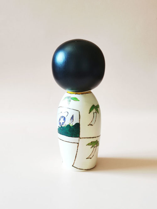 Tanabata Kokeshi doll by Oki Izumi with light summer kimono and Tanzaku pattern. Available at j-okini.com in malta