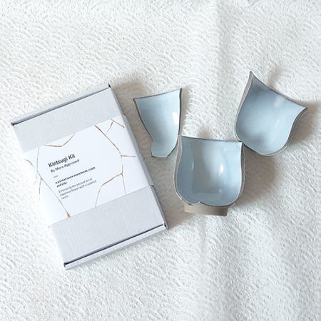 Kintsugi kit with a blue yunomi cup