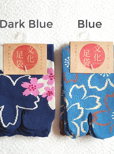 Tabi (足袋) are traditional Japanese socks worn with thonged footwear such as zōri, dating back to the 15th century These socks are fashionable Japanese socks for women. The main colour is blue and a pattern of Sakura in light pink. Size: One size Europe size 37 - 40. Benefits of Tabi socks Tabi socks are expected to have effects such as improving posture and reducing foot fatigue and pain. To get these effects, it is important to keep wearing them in your daily life. Available at j-okini.com Malta