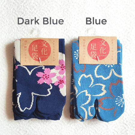 Tabi (足袋) are traditional Japanese socks worn with thonged footwear such as zōri, dating back to the 15th century These socks are fashionable Japanese socks for women. The main colour is blue and a pattern of Sakura in light pink. Size: One size Europe size 37 - 40. Benefits of Tabi socks Tabi socks are expected to have effects such as improving posture and reducing foot fatigue and pain. To get these effects, it is important to keep wearing them in your daily life. Available at j-okini.com Malta