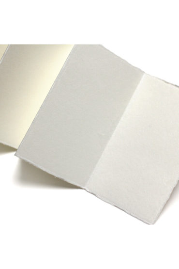 Crafted from seven exquisite sheets of washi, this set embodies the essence of traditional Japanese aesthetics. The natural hue of the washi paper harmonizes seamlessly with both ink and vibrant colors, offering a canvas that enhances your written words and artistic expressions. Versatile and Thoughtfully Designed This set offers unparalleled flexibility. With a simple cut, transform it into two elegant return postcards, perfect for sharing moments and memories. Alternatively, leave it uncut to compose a heartfelt, long letter that unfolds like a scroll. Its design also allows for it to be displayed upright, adding a touch of sophistication to any space. A Glimpse into Its Charm The final image showcases the potential of this unique paper - a testament to its beauty and versatility. Whether it's for personal use or as a thoughtful gift, this washi postcard set is sure to delight and inspire. Available at j-okini.com in Malta