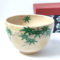 Kiyomizu-ware handmade Matcha bowl with green maple leaves painted on a warm beige base, inspired by Japan's early summer foliage. Buy it at j-okini in Malta.