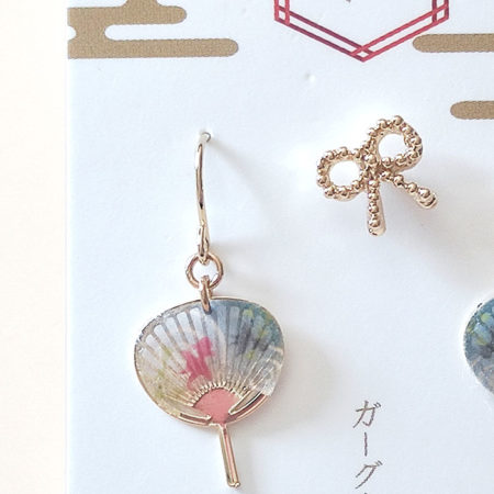 Japanese earring set including two mini uchiwa fan featuring a goldfish motif earrings with hooks , paired with a cute ribbon stud earring. Uchiwa fan has the desi Made in Japan! Available at j-okini.com in Malta