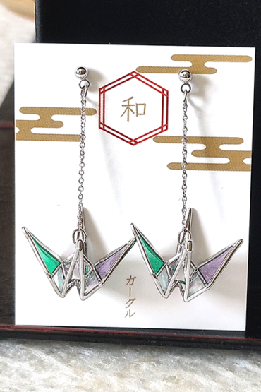Buy Handmade Stained Glass Origami Crane Earrings, a symbol of peace, is beautifully captured in these earrings with a delicate, three-dimensional motif. Available at j-okini.com in Malta