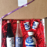 Complete sake gift set with premium sake bottles and ceramic sakeware, perfect for meals or special occasions. Available at j-okini.com in Malta