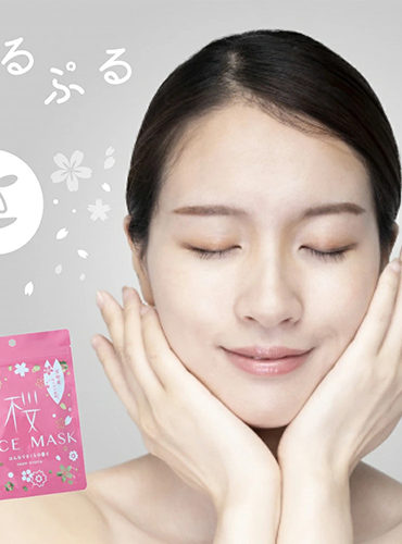 A pack of Kyoto Sakura Blossom Face Masks, featuring 7 sheets infused with hydrating and skin-brightening ingredients. Made in Japan, 100% cotton, and free from artificial coloring and mineral oil.