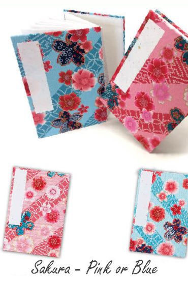 A Japanese Goshuincho accordion notebook with vibrant fabric covers featuring Sakura. Compact, with thick votive paper for ink, calligraphy, and journaling. Comes with a matching drawstring bag for easy carrying. Available at j-okini.com in Malta