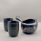 Japanese tea set with Tokoname black cat teapot and Mino black tea cups – lidless teapot with wide design for loose leaf tea. Made in Japan. Available at j-okini.com in Malta