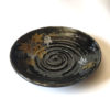 Black porcelain plate with a spiral-carved surface and gold and silver painted Maple leaves – part of a seasonal Japanese Mino-yaki plate set. Available at j-okini.com in Malta