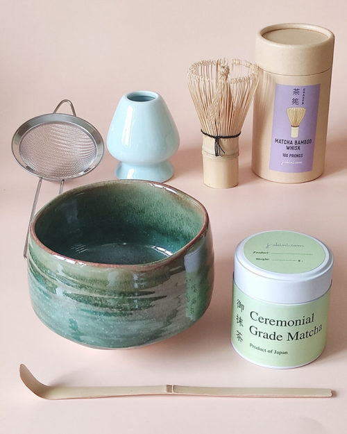 Matcha tea set with a Shakugama chawan, ceremonial Matcha tea, bamboo wihisk and scoop,, whisk stand in mint, and matcha tea sifter