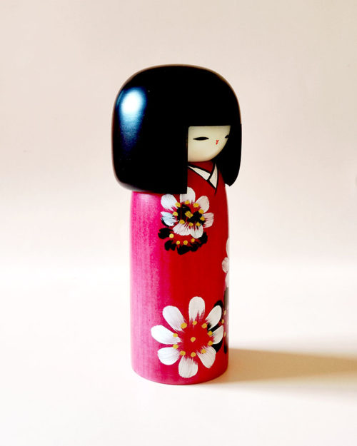 Japanese Kokeshi doll Hana Guruma with hand-painted floral kimono, modern creative design by Usaburo.. Buy it online at j-okini.com in Malta