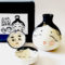 Japanese ceramic sake set with Okame and Hyottoko designs. Made in Japan. Available at j-okini.com in Malta