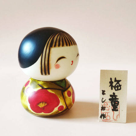 Hand-painted Japanese Kokeshi doll Ume Warabe with round head and body. Buy it online at j-okini.com in Malta