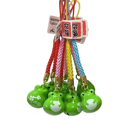 Cute frog-shaped bell netsuke charm with four-leaf clover. Brass netsuke bell symbolizing safe return and good fortune. Available at j-okini.com in Malta.