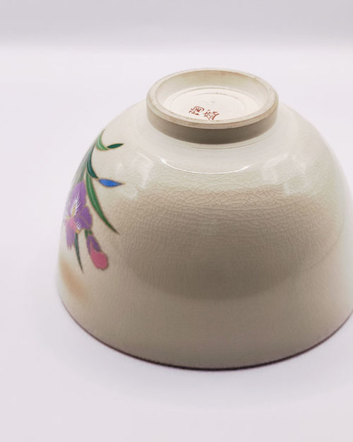 Vintage handmade Matcha bowl with kabuto samurai helmet and Japanese iris design, gold rim, signed by artist Tōsei.