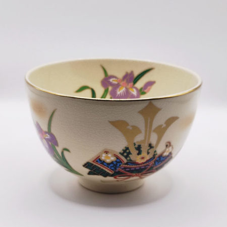 Vintage handmade Matcha bowl with kabuto samurai helmet and Japanese iris design, gold rim, signed by artist Tōsei.