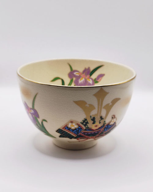 Vintage handmade Matcha bowl with kabuto samurai helmet and Japanese iris design, gold rim, signed by artist Tōsei.