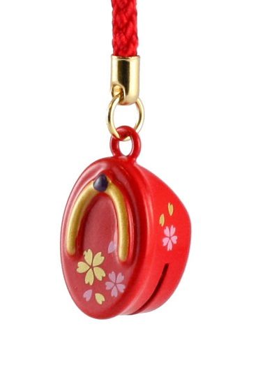 Small red Pokkuri bell netsuke shaped in traditional Japanese wooden clogs. Japanese accessory available at j-okini.com in Malta