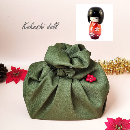 Kokeshi doll wrapped in j-okini furoshiki wrapping cloth,. Gifts idea from Japan. Available at j-okini.com in Malta