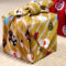 Maneki-Neko Furoshiki Wrapping Cloth | 48cm in mustard color with different smiley maneki-neko. Made in Japan. Available at j-okini.com in Malta
