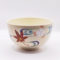 Vintage handmade Kyo-yaki Matcha bowl with maple leaf and sakura design on cream glaze, accented with blue curved lines. Available at j-okini.com in Malta