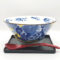 Blue and yellow Japanese ramen bowl with dragon design, red-brown spoon, and black tray – Mino ware set made in Japan. Available at j-okini.com in Malta