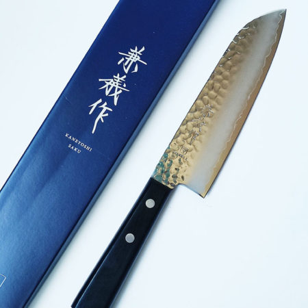 Discover the Kaneyoshi VG10 Tsuchime Santoku 165mm by Yaxell. Sharp, lightweight, durable, and beautifully crafted in Japan. Available at j-okini.com in Malta