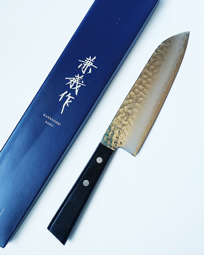 Kaneyoshi VG10 Tsuchime Santoku Knife 165mm – Yaxell Discover the Kaneyoshi VG10 Tsuchime Santoku 165mm by Yaxell. Sharp, lightweight, durable, and beautifully crafted in Japan. Available at j-okini.com in Malta