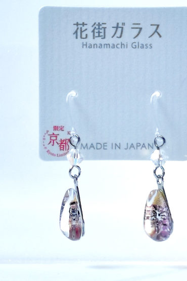Side angle of Hanamachi glass earrings in purple