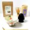 Japanese matcha starter set with a small Nadeshiko flower matcha bowl, bamboo whisk, bamboo scoop, whisk stand, and Uji Kyoto matcha tea.