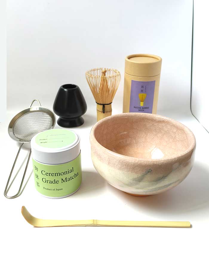 Luxury Japanese ceremonial matcha tea set with handmade Kiyomizu ware bowl, bamboo whisk, scoop, whisk holder, tea sifter, and Miyabi ceremonial grade matcha.