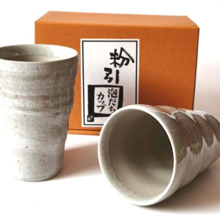 Pair of Japanese Mino Ware Kohiki ceramic beer cups designed to create creamy foam, 180ml each