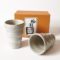 Pair of Japanese Mino Ware Kohiki ceramic beer cups designed to create creamy foam, 180ml each