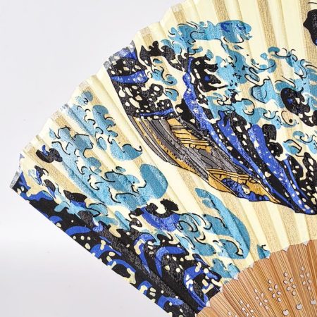 Japanese silk folding fan featuring Hokusai's The Great Wave off Kanagawa ukiyo-e artwork with bamboo ribs, 22cm.