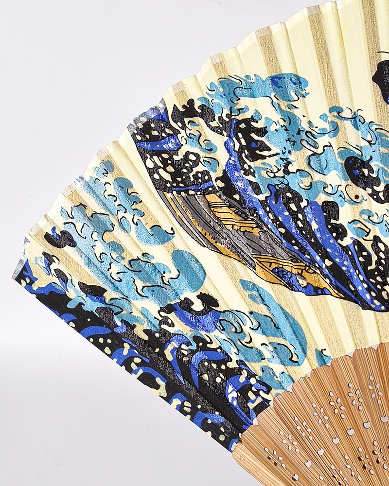 Japanese silk folding fan featuring Hokusai's The Great Wave off Kanagawa ukiyo-e artwork with bamboo ribs, 22cm. Japanese silk folding fan featuring Hokusai's The Great Wave off Kanagawa ukiyo-e artwork with bamboo ribs, 22cm.