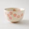 Japanese Hanachirashi white matcha bowl with scattered cherry blossom design, Mino ware chawan made in Japan