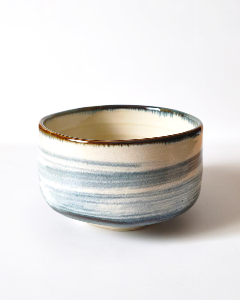 Harugasumi Japanese Mino ware matcha bowl with soft blue-grey glaze on white porcelain, made in Japan | j-okini Malta