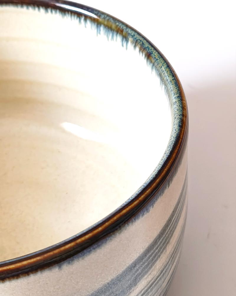 Harugasumi Matcha Bowl | Japanese Mino Ware Harugasumi Japanese Mino ware matcha bowl with soft blue-grey glaze on white porcelain, made in Japan
