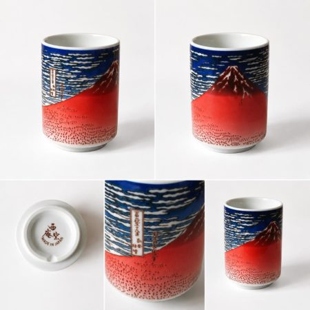 Japanese Mino Ware Yunomi featuring Hokusai’s famous Red Fuji. 270ml porcelain teacup with a textured wraparound ukiyo-e design, made in Japan.