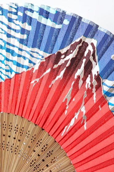 Japanese silk folding fan featuring Hokusai's Red Fuji (Aka Fuji) ukiyo-e design with bamboo ribs, 22cm. Malta Europe