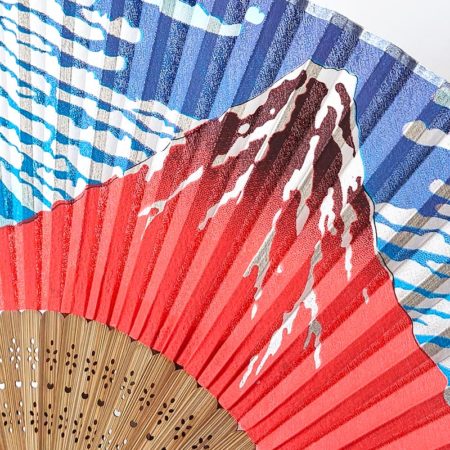 Japanese silk folding fan featuring Hokusai's Red Fuji (Aka Fuji) ukiyo-e design with bamboo ribs, 22cm. Malta Europe