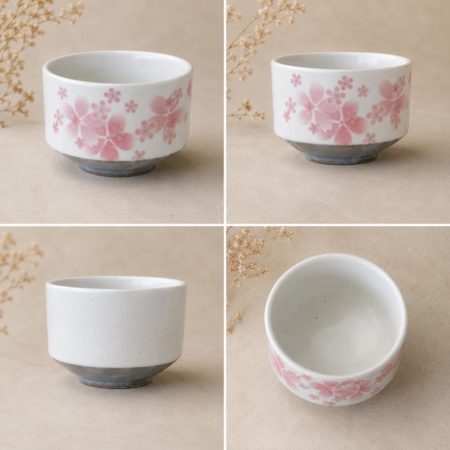Japanese Sakura layered matcha bowl made in Japan with layered pink cherry blossom design, white Mino ware chawan and grey base