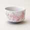 Japanese Sakura Shizuku matcha bowl made in Japan with delicate cherry blossom design, white Mino ware chawan and grey base for preparing matcha tea Available at j-okini.com in Malta