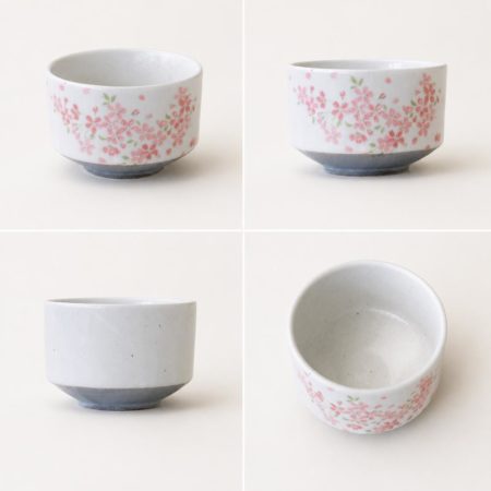 Japanese Sakura Shizuku matcha bowl made in Japan with delicate cherry blossom design, white Mino ware chawan and grey base for preparing matcha tea Available at j-okini.com in Malta