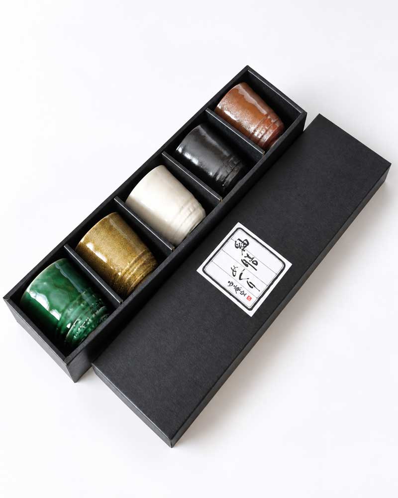 Japanese Mino Ware Yunomi Tea Cup Set – Yuuzen Meguri Gosai | 5 Cups Japanese Mino Ware yunomi tea cup set with five different coloured glazed porcelain cups in gift box. Buy it on j-okini Malta